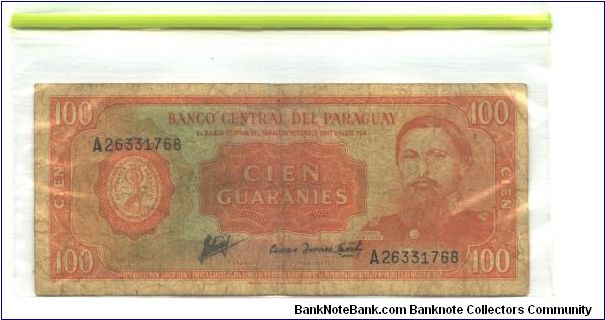 Like #198 Orange on multicolour underpint. Two signature varieties (small size signature).

General Jose E. Diaz at right. Black serial # upper left and lower right. Ruins of Humaita on back. Banknote