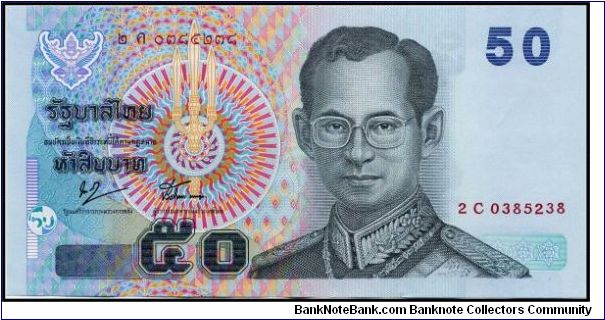 50 Baht Note. Approx date is 2005, I don't know for sure. Consecutive Serial #. Banknote