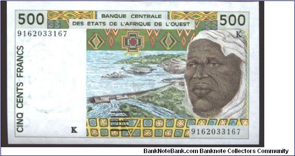 Dark brown and dark green on multicolour underprint. Man at right and as watermark, flood control dam at center. Farmer riding spray rig behind garden teactor at center, native art left ob back. Banknote