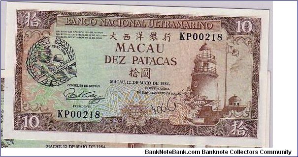 MACAU--
  500 PATACAS
  ESPECIME
THE CIRCULATED NOTE IS VERY DIFFICULT TO FIND IN UNC Banknote