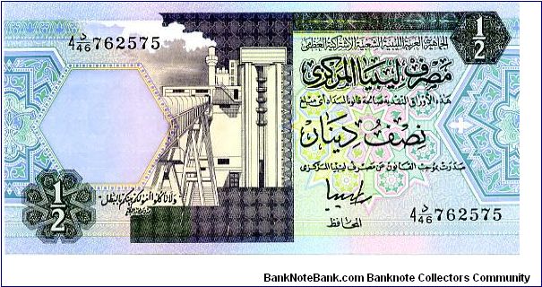 1/2 Dinar
Blue/Purple/Green
Oil refinery
Irrigation system
Security thread
Wtrmk Coat of arms Banknote
