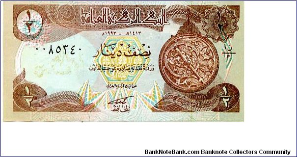 1/2 Dinar
Purple/Blue/Green
Astrolabe 
Minaret of Samarra Banknote