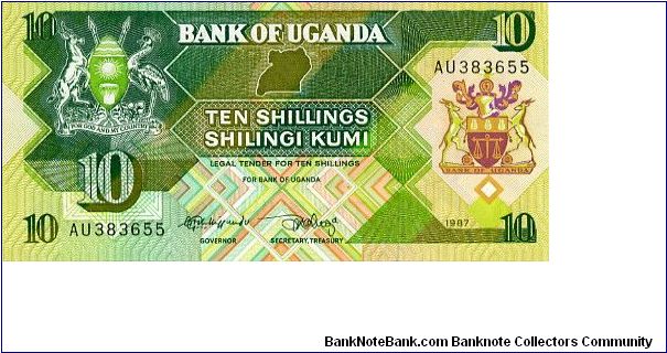 10 Shillings
Green/Brown
Coat of arms each side of value
cattle, bamboo, bananas, canoe
Security thread
Watermark Bird Banknote