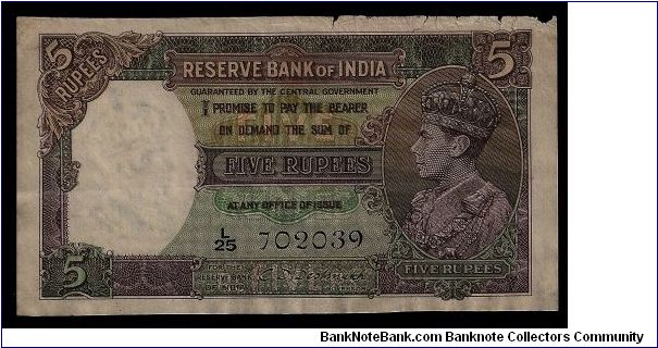 Reserve Bank of India 5 Rupees # L/25 702039. 1943, P-18b. Slight wearing along the top edge, some crinkling and yellowing but otherwise in good condition. Banknote