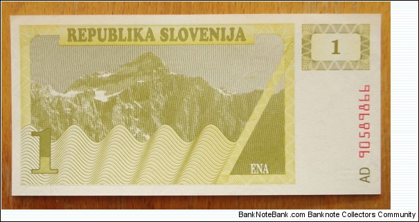 Banka Slovenije |
1 Tolar |

Obverse: Triglav mountain ridge |
Reverse: Pedimated bee-hive |
Watermark: Repeated crosses Banknote