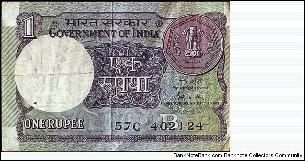 India 1989 1 Rupee.

Inset letter 'B'.

Off-centre error. Banknote