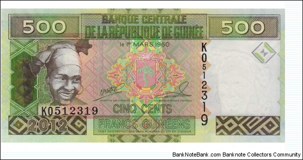 500 Francs. Woman at left, arms at center and traditional wooden sculpture at right on face; minehead at center on back. Banknote