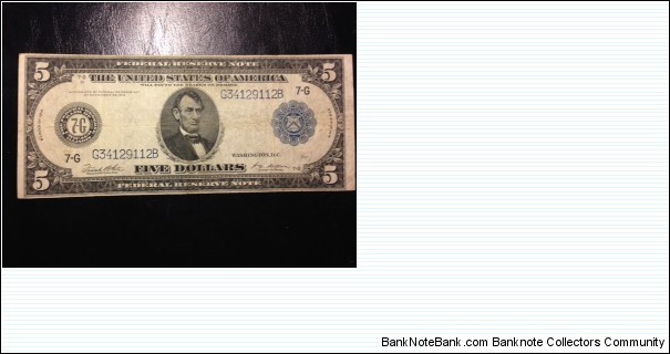 A nice example of the 1914 $5 FRN with the White-Mellon signature combination. Banknote