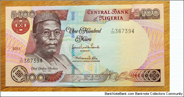 Nigeria | 
100 Naira, 2011 | 

Obverse: Chief Ọbáfẹ́mi Awólọ́wọ̀ | 
Reverse: Zuma Rock, and Coat of Arms | Banknote