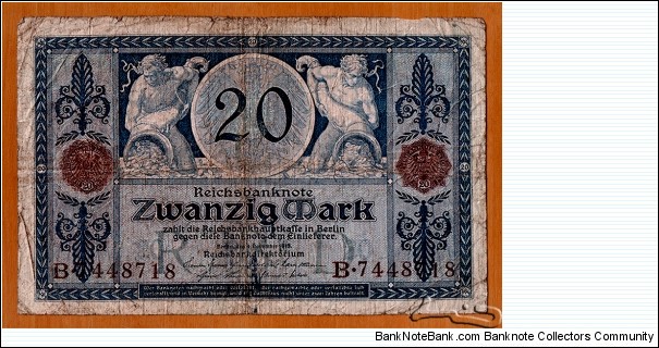 German Empire | 
20 Mark, 1915 | 

Obverse: Two male figures each holding a cornucopia (Horn of Plenty) | 
Reverse: Two portraits, which are the symbols for Work (male) and Rest (female) | Banknote
