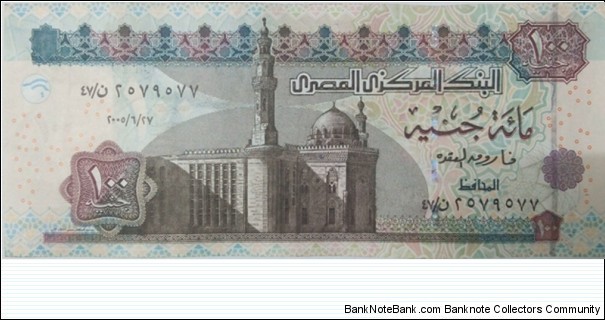 100 £ - Egyptian pound
Signature: Farouk Abdel Baky El Okda (2nd kind)
Dark brown and brown-violet on multicolored underprint. Sultan Hassan Mosque at lower left center. Sphinx at center on back. With wide segmented silver security strip and added rosette printed in optical variable ink.
 Banknote