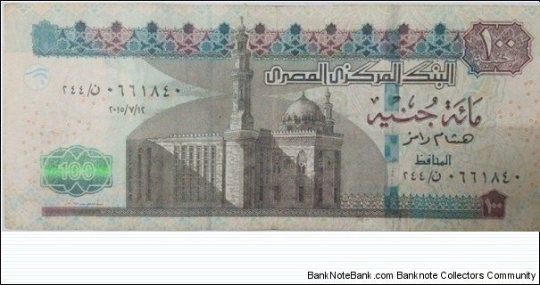 100 £ - Egyptian pound
Signature: Hisham Ramez
Brown, green, and multicolored. Sultan Hassan mosque. Back: sphinx. Improved version. Wide segmented security thread. Banknote